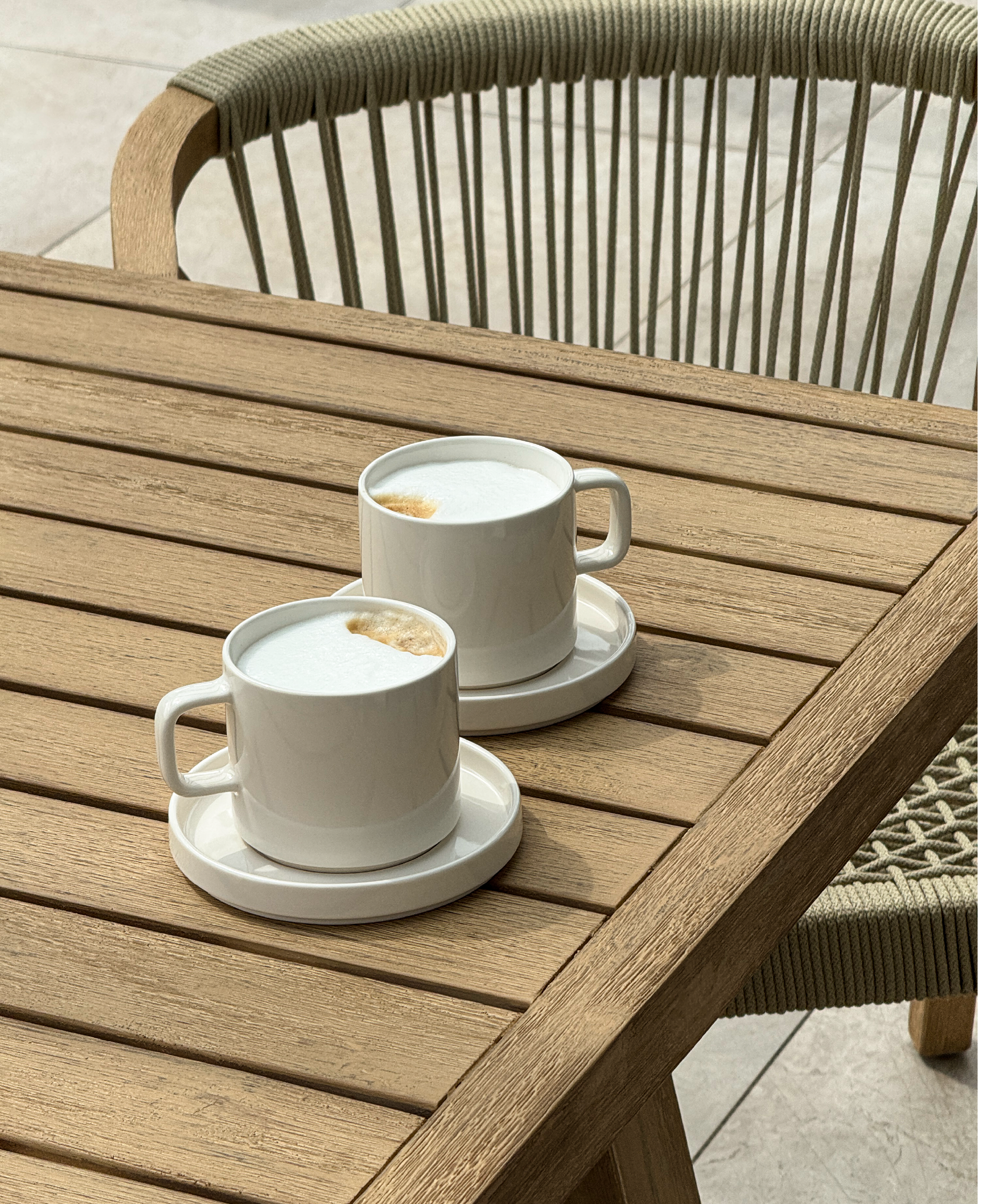 Tasse mit Untertasse in Cremeweiß glänzend | Nia