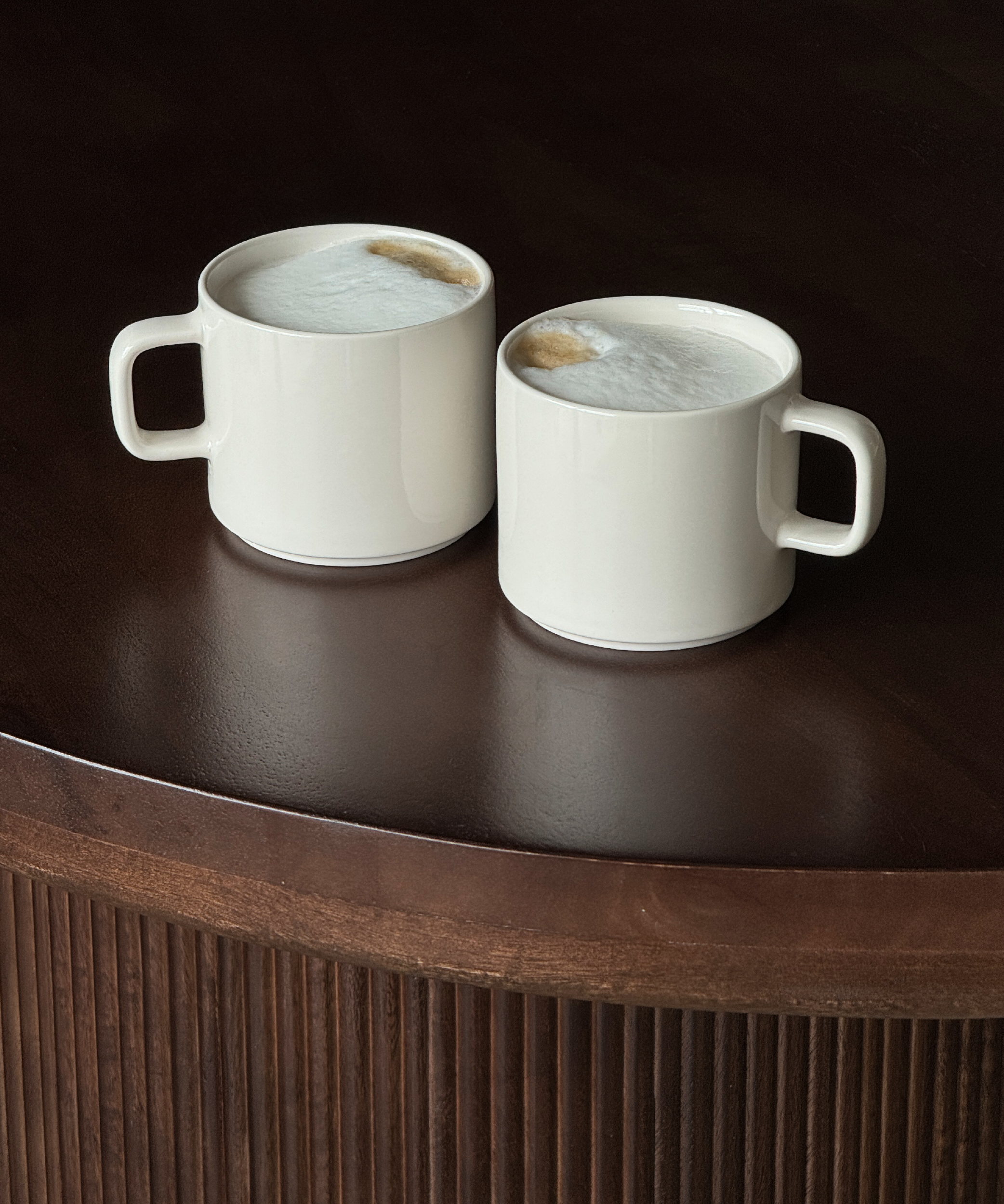 Tasse mit Untertasse in Cremeweiß glänzend | Nia