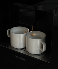 Tasse mit Untertasse in Cremeweiß glänzend | Nia