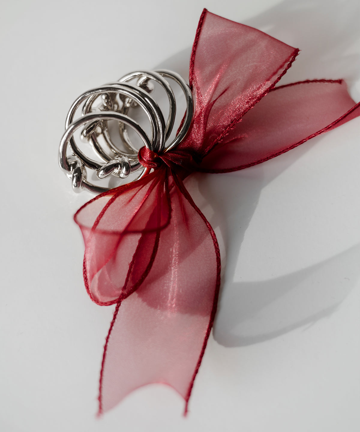 Serviettenringe in Gold und Silber im 2x 6er Set aus der Serie Tye – Draufsicht